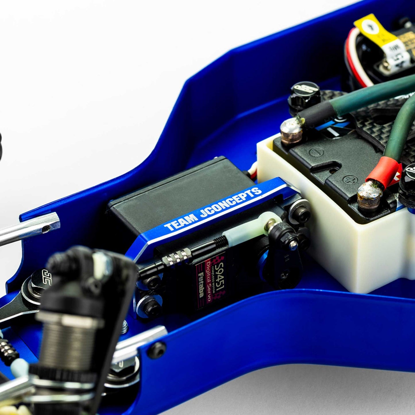 Blue Servo Mount Bracket for RC10, RC10T, and RC10GT (JCO5219-1)
