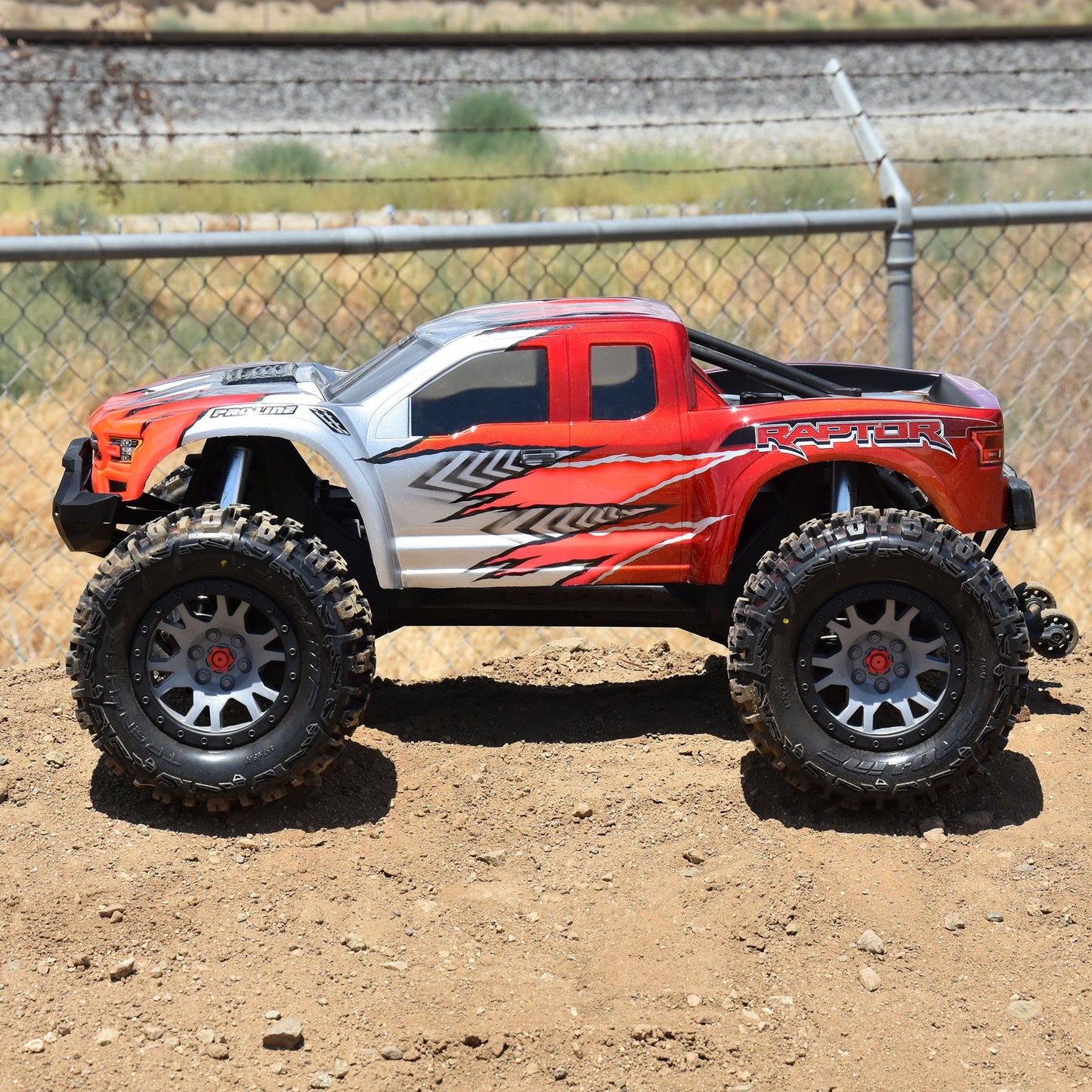 Limited Edition Trencher Pro-Loc F/R Mounted 24mm Gray/Black Impulse (2) for X-Maxx (PRO1015114)