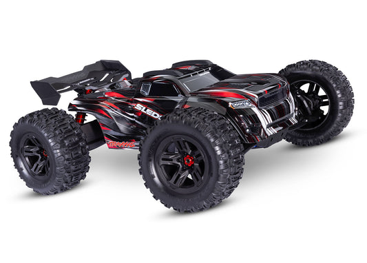 A studio shot of the 1/8 Sledge with Belted Sledgehammer Tires Ready to Run (Red) (TRA95096-4-RED).